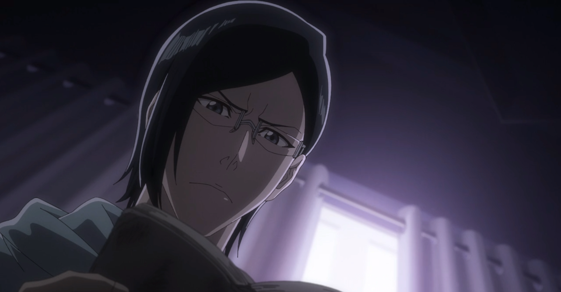 Uryu looks downward at a journal from his father's desk