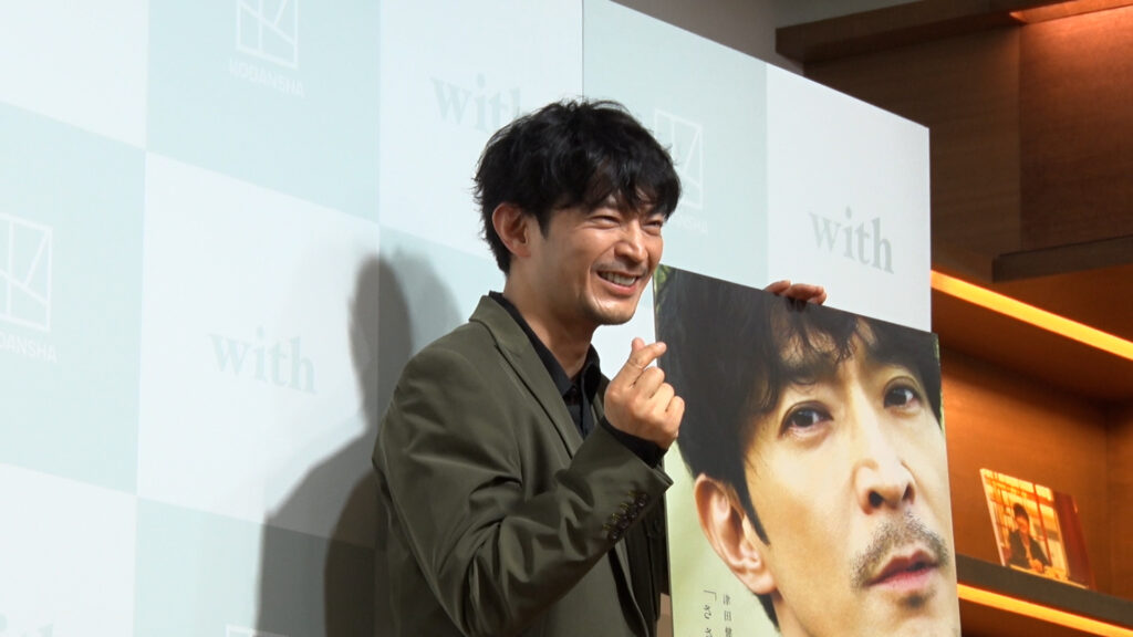 Kenjiro Tsuda attending his photobook “Whisper” commemorative release press conference